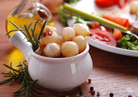 caramelized onions in small white bowlの写真素材