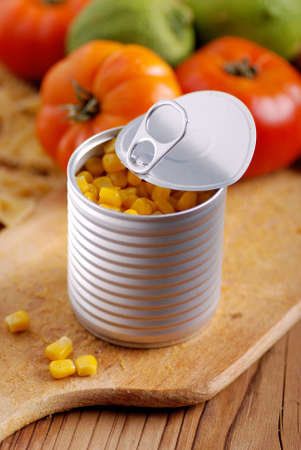 corn in tin metal on wood table