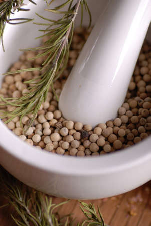 white pepper in a mortarの写真素材