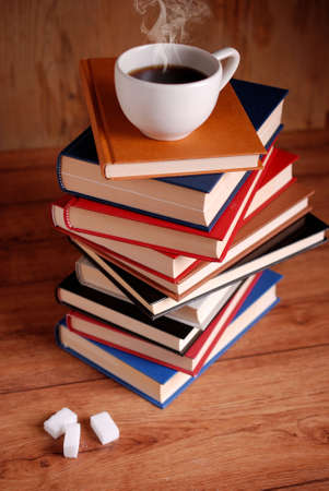 pile of books on wooden tableの写真素材