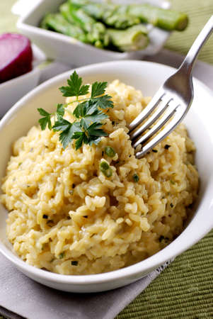 asparagus risotto with ingredients aroundの写真素材