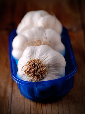 fresh garlic in a small container