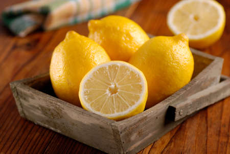 yellow lemons of Sorrento organic on the wooden tableの写真素材