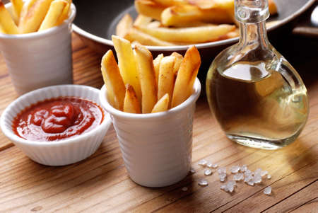 portion of french fries with ketchup