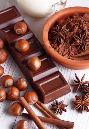 chocolate with hazelnuts and ingredients around