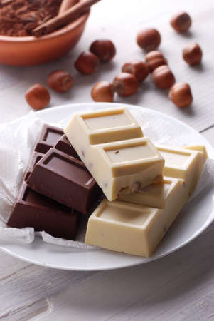 chocolate with hazelnuts and ingredients aroundの写真素材