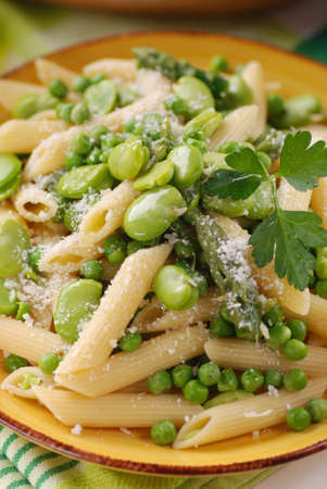 pasta with fresh broad beans, asparagus and peasの写真素材