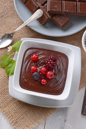 chocolate mousse decorated with berries