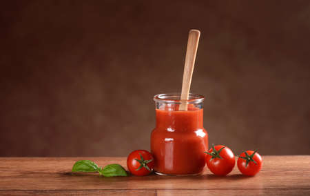 tomato sauce in glass jarの写真素材