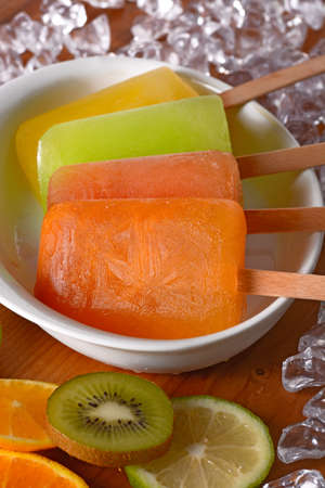colorful fruit icicles with ingredients