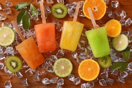 colorful fruit icicles with ingredients