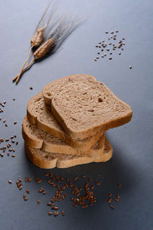 white bread with cereals and flax seedsの写真素材