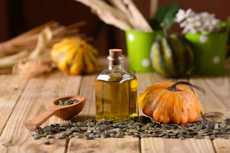 pumpkin seed oil in glass bottleの写真素材