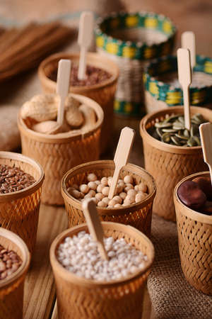 basket with soybeans with other ingredients and legumes aroundの写真素材