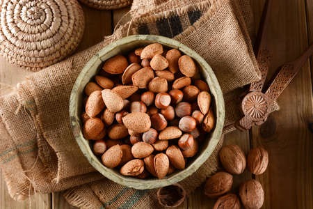 Mix of dried fruits in the wood bowl