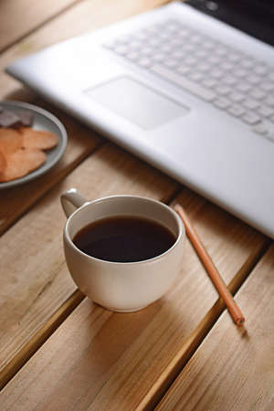 Coffee break in the office with cup of coffee