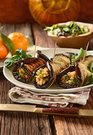 eggplant rolls stuffed with rice and vegetables.の写真素材