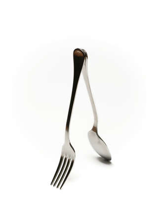 spoon and fork on white background - closeupの写真素材
