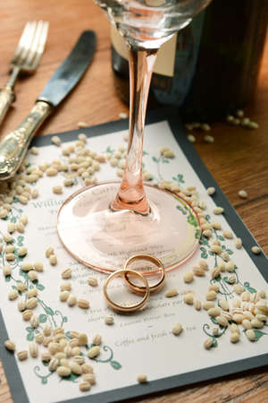 wedding menu with gold rings - closeupの写真素材