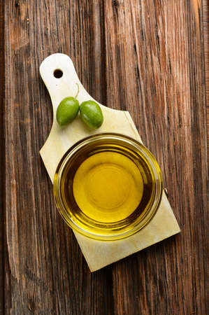 Italian olive oil in glass bowl - organic - closeupの写真素材