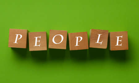 the word people on wooden cubes - closeupの写真素材