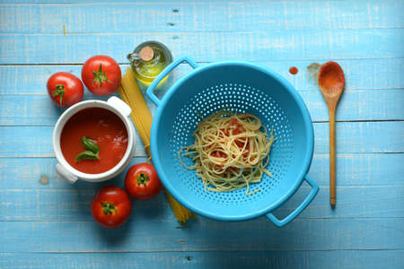 spaghetti with tomato sauce and parmesan cheese - traditional italian recipe - closeupの写真素材