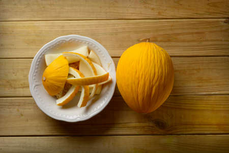 melon peels in the white plate - closeup