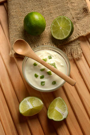 yogurt with lime juice with fruits around - closeupの写真素材