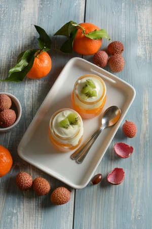 delicious dessert with lychees mousse and tangerine cream - closeupの写真素材