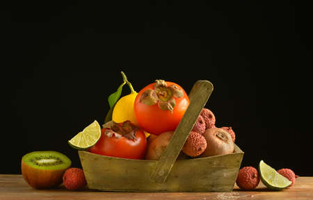 pile of exotic fruits on the black background - closeupの写真素材