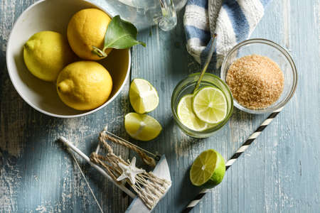 thirst-quenching lime drink with fruit slices in the glass - closeupの写真素材