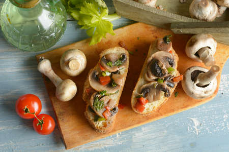 Rustic Toast bread with mushrooms and vegetables assorted - closeupの写真素材