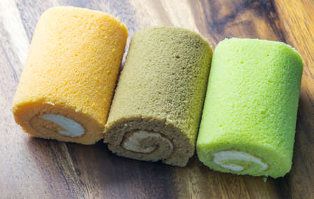 cake roll on wooden tableの写真素材