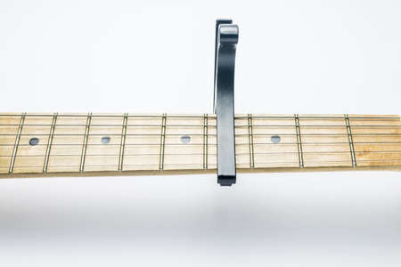 capo, black capo on white background