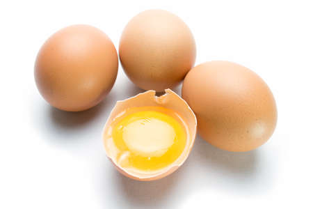 egg on white background with egg is brokenの写真素材