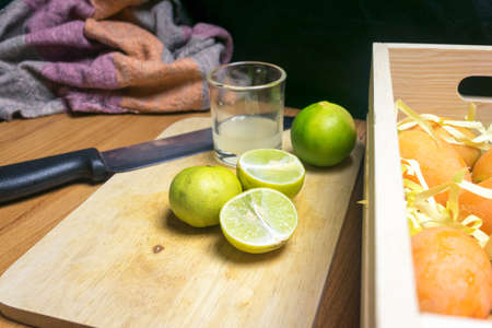 slice the lemon lime on wooden boardの写真素材