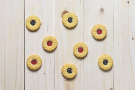 Cookie biscuits on wooden table, flat layの写真素材