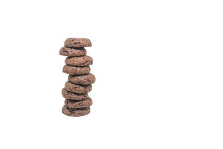 Stack of soft chocolate cookies and brownies isolated on white background
