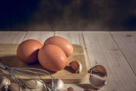 egg on wooden table, mystic photography and selective focusの写真素材