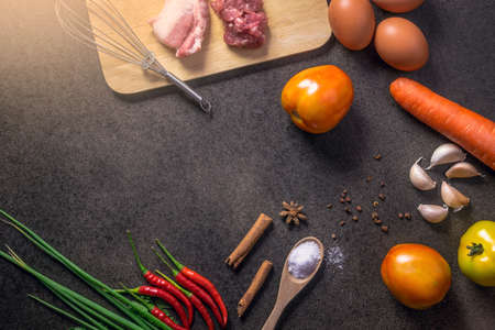 Fresh Vegetables for Healthy Diet on a rustic table. Top view, copy space, dark background