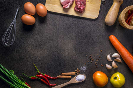 Fresh Vegetables for Healthy Diet on a rustic table. Top view, copy space, dark backgroundの写真素材