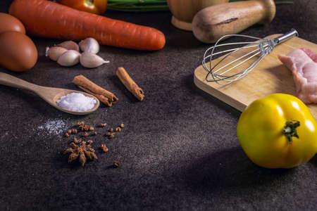 Fresh Vegetables for Healthy Diet on a rustic table and dark backgroundの写真素材