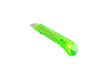 Green paper cutter knife isolated on white backgroundの写真素材