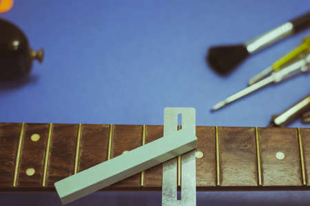 electric guitar on guitar repair deskの写真素材