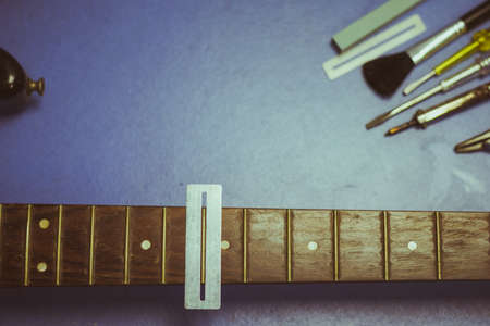 electric guitar on guitar repair deskの写真素材