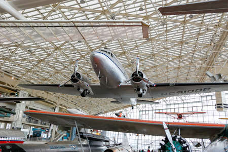 SEATTLE, WA - APRIL 8, 2017: The nine-ton Douglas DC-3 N138D NC91008 hang from the space-frame ceiling in the T. A. Wilson Great Gallery of the Museum of Flight in Seattle, Washington, USA.のeditorial素材
