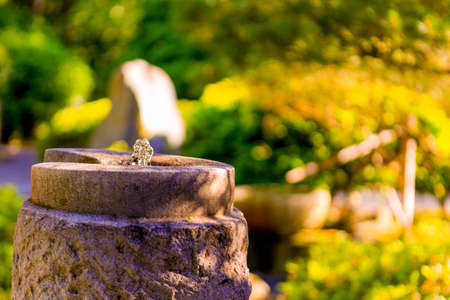 Close up view of Stone fountain in the early morning at Japanese Gardenの写真素材