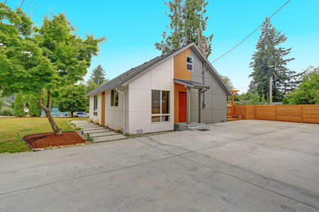 Completely renovated Modern Home in Everett, WA. View of the back yard with spacious concrete patio areaの写真素材