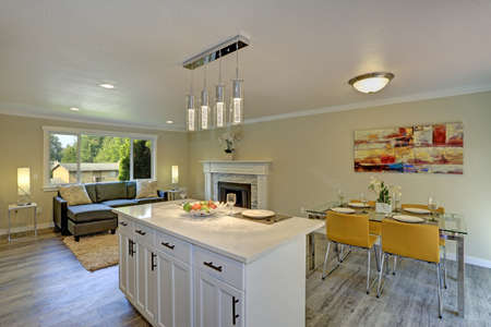 Beautiful open plan second floor living room, kitchen and dining space. Kitchen boasts a bar island...