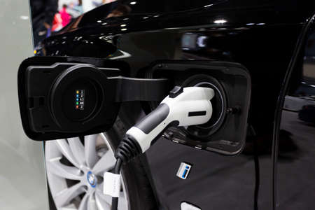 SEATTLE, WA - NOVEMBER 12, 2017: Close up of BMW electric charger handle at Seattle International...